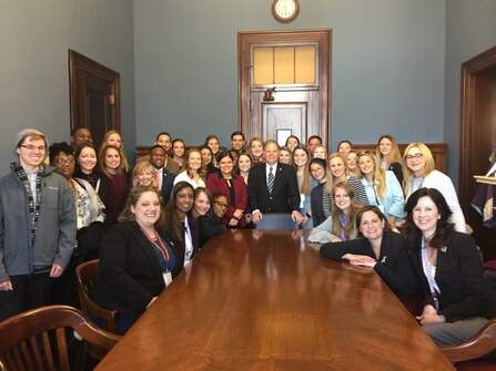 UA Students and faculty in a legislator's office during the School of Social Work DC Fly-In. 
